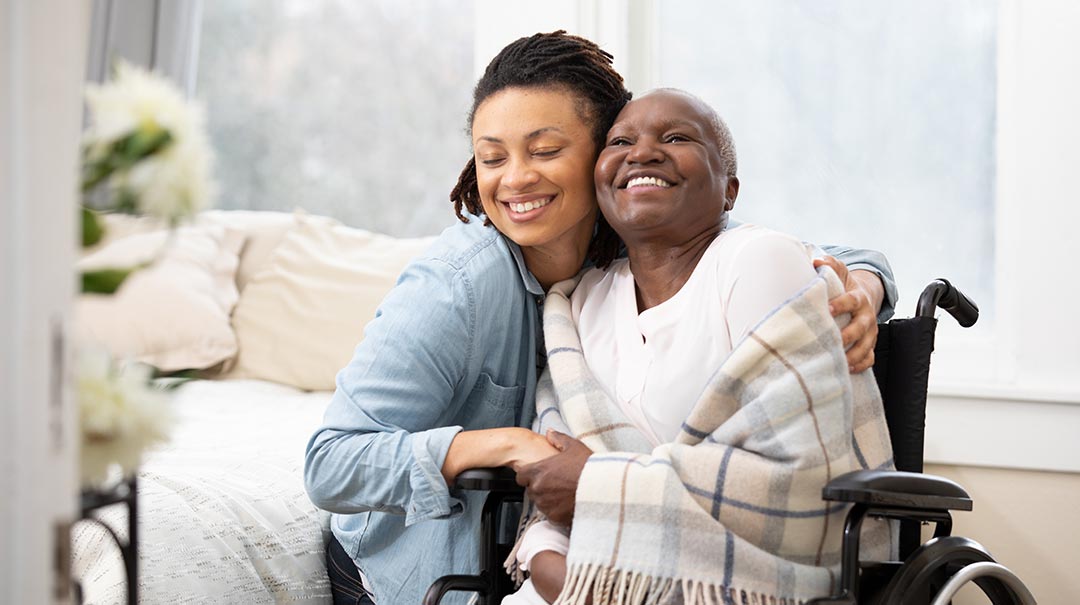Young volunteer delivering groceries to a senior – A volunteer handing a grocery bag to a senior client at their front door, both sharing a friendly moment.